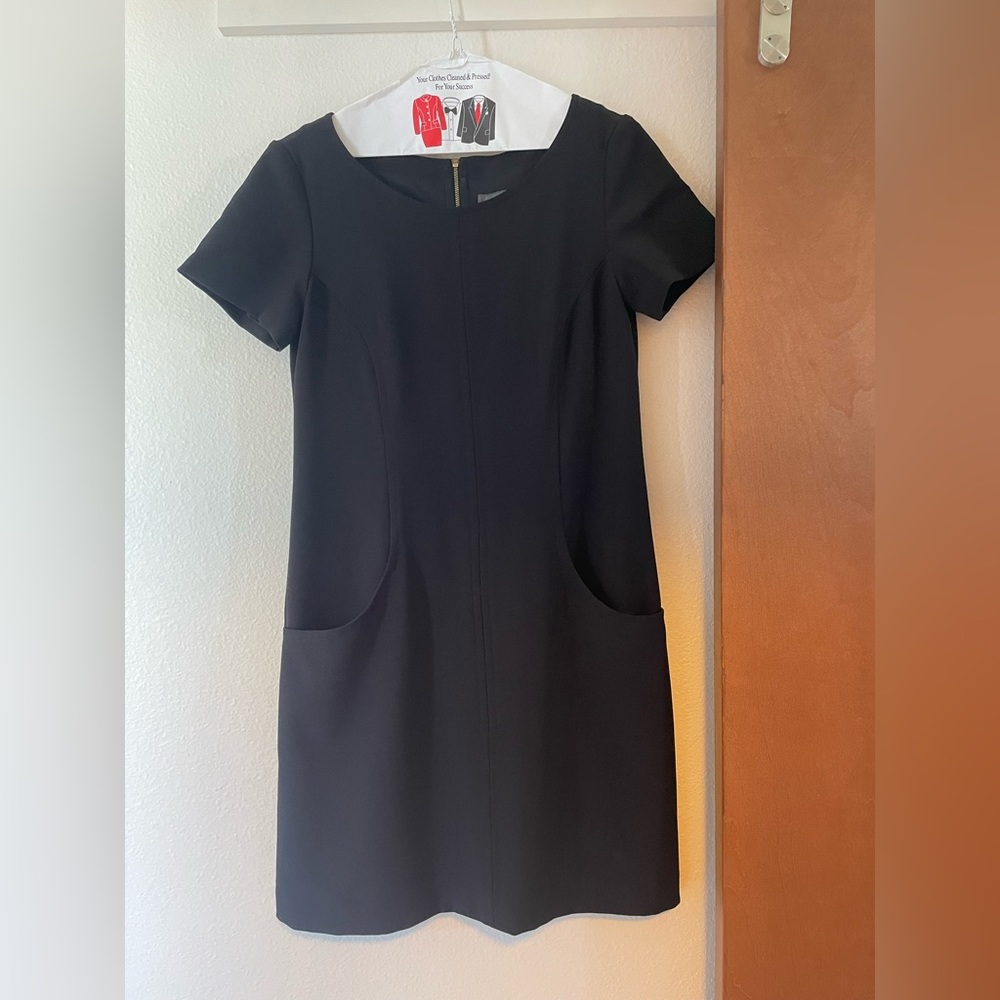 Black shift dress with pocket and cap sleeves